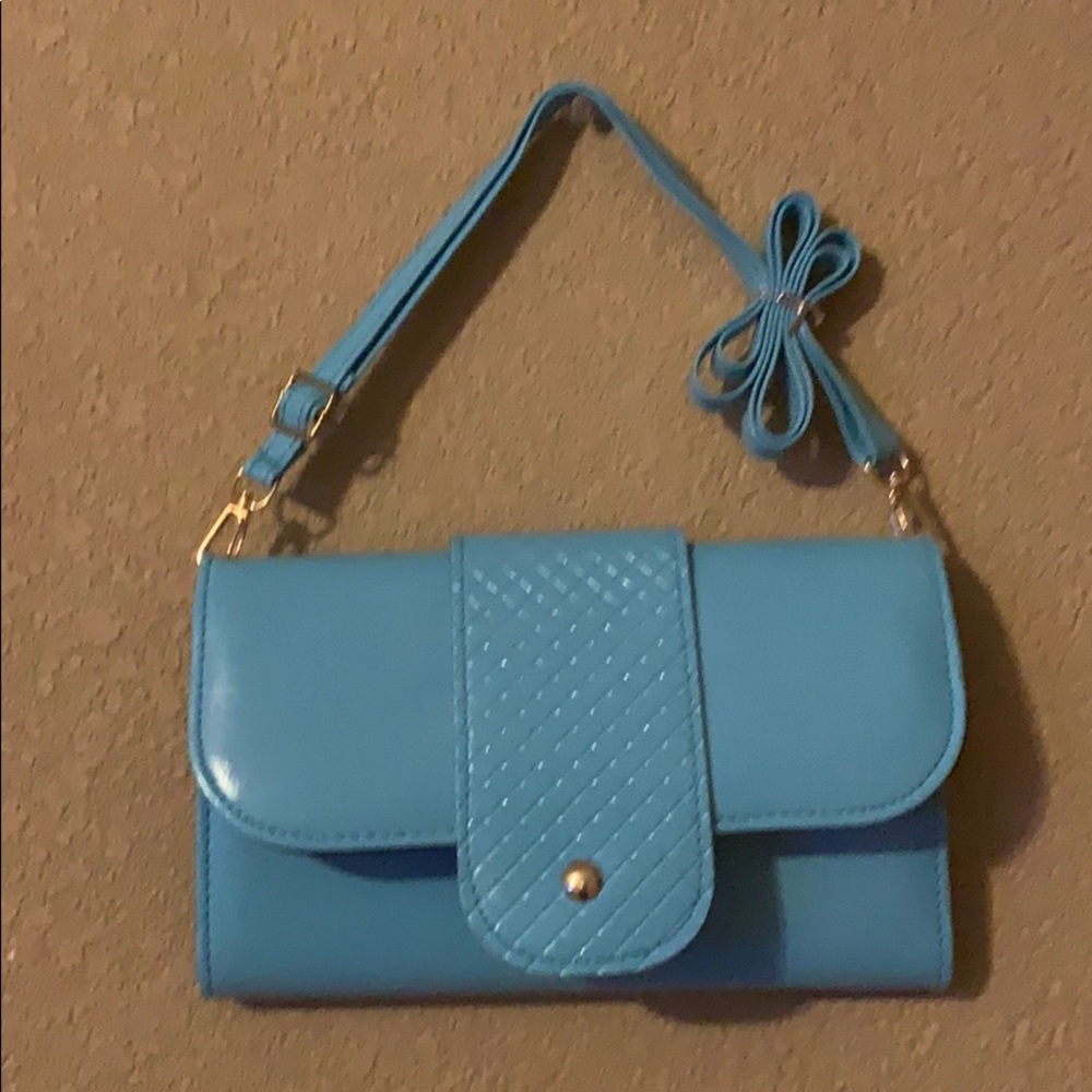 Blue purse and cosmetic bag